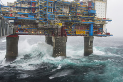 dequalized:
“Sleipner A, a combined accommodations, production and processing offshore platform in the Alfa Sentral Gas and Condensate Field, North Sea, Norway, during a storm. Photo by Øyvind Hagen via Statoil ASA.
”
