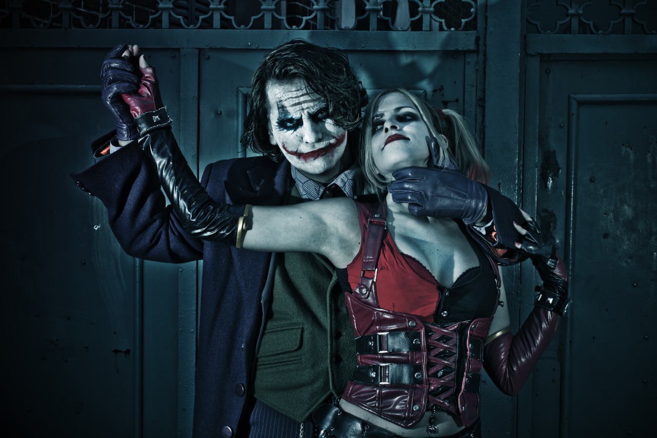 comicbookcosplay:  Leandro as Batman The Dark Knight Joker, and Jessica as Arkham