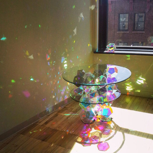 Sparkle Tables by John FosterA series of ‘reversed pyramid cut glass crystals’ which split the natural light into hundreds of rainbow reflections.