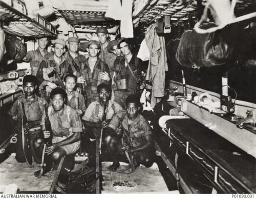 Ill-fated team of Coastwatchers on the U.S. Submarine DACE, about to be landed at night on beach nea