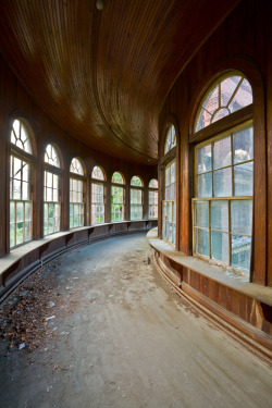 It really tears at my heart when they bulldoze one of my lovely asylums for no particular reason.  Pictured here is the wooden skyway that connected the 1854 Kirkbride building at Taunton State Hospital with the later infirmary ward.  It is now in pieces