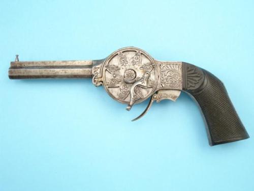 Engraved Noel and Gueury revolving turret pistol, France, mid 19th century.