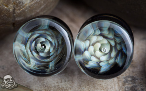 bodyartforms:  5/8” Glass plugs by Modifika http://www.bodyartforms.com/products.asp?brand=Modifika&material=Glass&new=Yes 