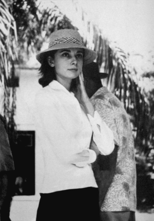 Audrey Hepburn explores the filming location in Kisangani, Congo on a day off from shooting The Nun&