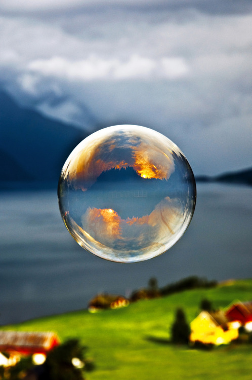 r2–d2:  Morning light reflected in a soap bubble over the fjord by (Odinodin) | Website 