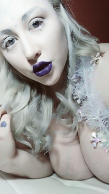 KyraKane99 is frosted with purple and white.
