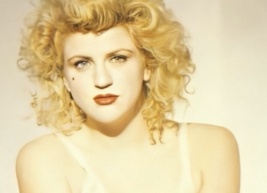 w her faux old hollywood looking beauty mark. 1980s.