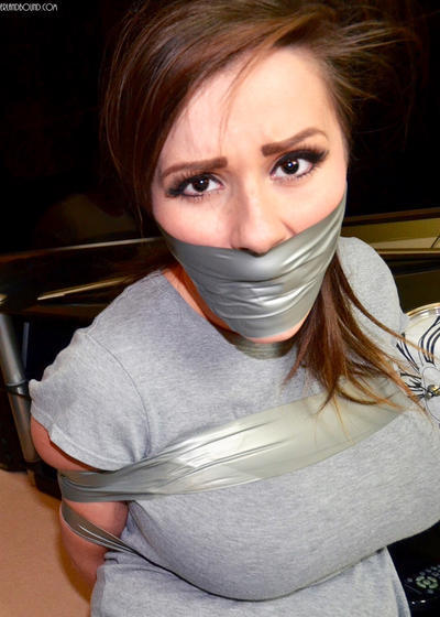 kiltedpatriot:  mmpphhmmpphh:  Wrap tape gags   Ahhhhhh…my favorite kind of gag, the wrap tape gag. It makes the lovely ladies look their best, as it’s the perfect fashion accessory, and it keeps them quiet during their kidnapping & helpless fun