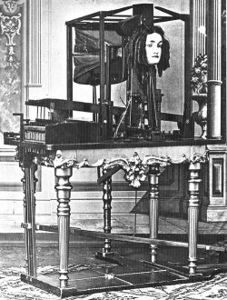 congenitaldisease:  In 1845, Joseph Faber, invented the Euphonia, which consisted of a head that spoke in a “weird, ghostly monotone” voice and was controlled with foot petals and a keyboard.   “By pumping air with the bellows … and manipulating