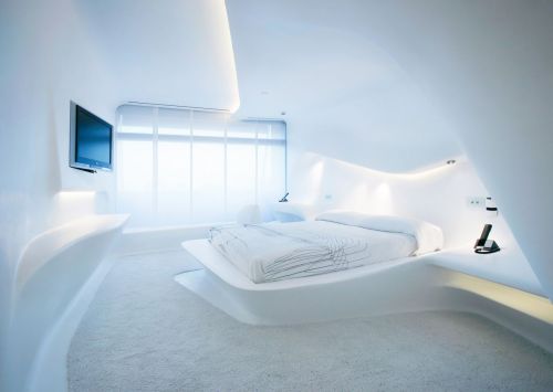 luxuryaccommodations:  Zaha Hadid Floor at Silken Puerta América Madrid One of the highlights of Madrid’s Hotel Puerta America is the floor designed by Zaha Hadid - the first woman awarded with the prestigious Pritzker Architecture Prize. Combing her