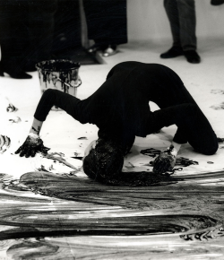 Curties:  Janine Antoni In The Documentation Of The Performance Loving Care. In It, Antoni