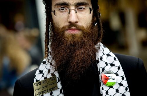 A member of Neturei Karta, a radical anti-Zionist / pro-Palestinian ultra-Orthodox Jewish movement, 