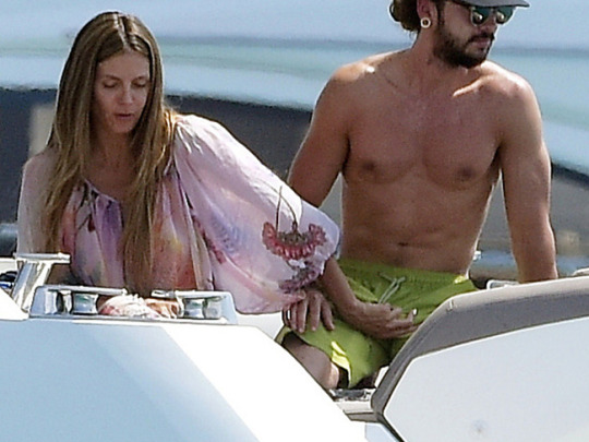 Heidi Klum Grabbing Boyfriend’s Cock Hard Heidi Klum is still full of life and lust and she shows it when she thinks that she is alone with her boyfriend on her yacht. She puts her hand on his cock and she massages it in a very alluring way. Every