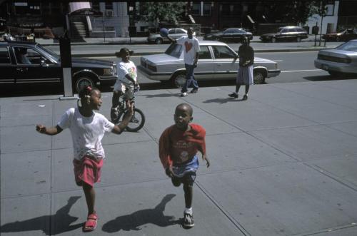 manufactoriel: Kids playing on 125th street, Harlem (2000) by David Alan Harvey