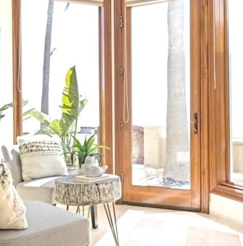 Loft-Style Family Room Orange CountyFamily Room - Huge Coastal Loft-style Carpeted, Beige Floor And Exposed