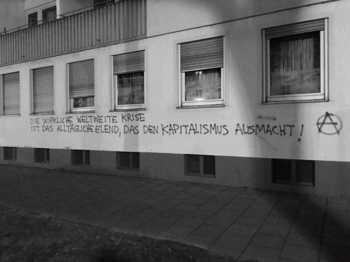 “The real global crisis is the everyday misery that makes up capitalism” Seen in Munich,