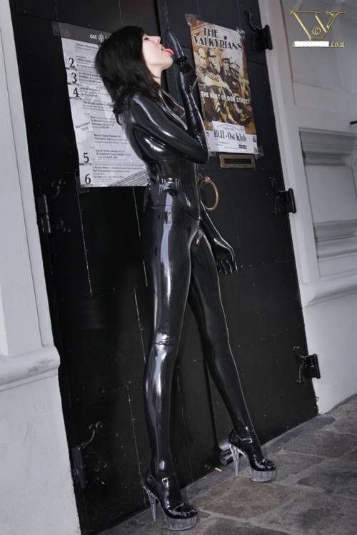 fuckiamsexedout:  Girl in Latex Catsuit in public with inflatable dildo in her pussy 