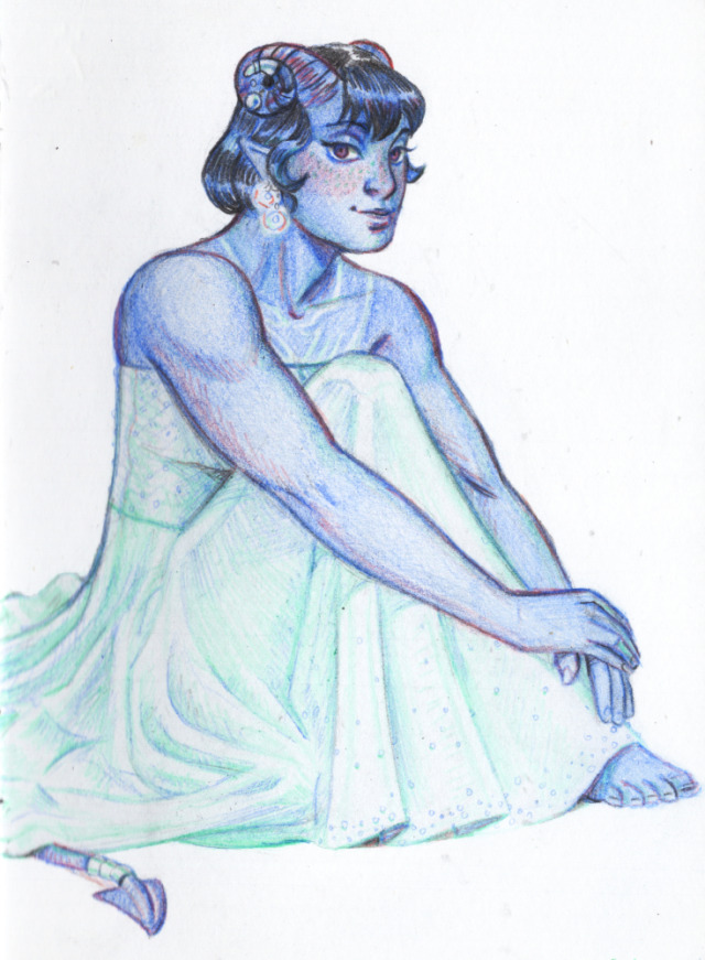 A colour pencil drawing of Jester Lavorre from Critical Role. She is shown sitting on the floor in three quarter's view, wearing a glamorous gown. She looks directly at the viewer with a sweet and innocent looking smile. She has one knee tucked up against her chest, and her other leg is folded under her dress. She has her hands folded over each other at the bottom of her shin. She wears a long, white, strapless dress - simple but elegant, with little white beads on the bottom and on the bodice.