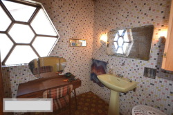 terriblerealestateagentphotos:  The interior of the Millenium Falcon was something of a disappointment.