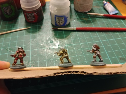 Some very rough tests of different colour schemes. Red and white with a brown tint to the white padd