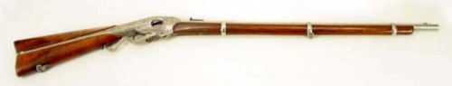 A rare L.D. Nimschke engraved Evans lever action repeating rifle, circa 1870’s.Sold at Auction: $30,