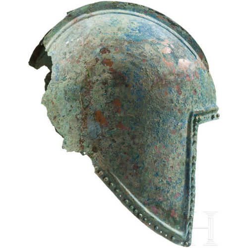 Illyrian bronze helmet with decorative gold crest, 5th century BC.from Hermann Historica