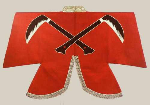 Jinbaori (samurai outer jacket).  Design of crossed sickles on red woolen fabric.  Late 16th century