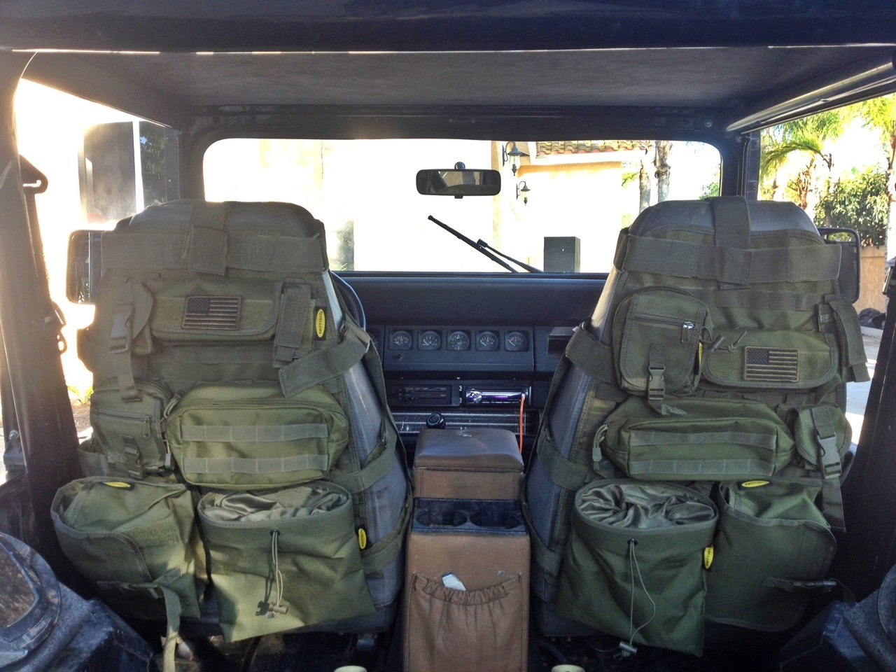 foil-licker:Tax refund coming in clutch, got some new seat covers for the Jeep.