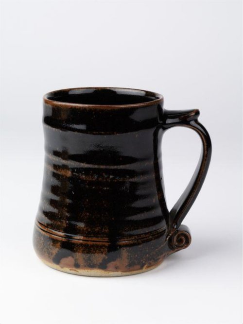 Standard Ware tankard, stoneware with tenmoku glaze by Bernard Leach, 1949.