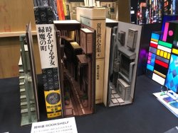 itscolossal: Miniature Installations Transform Bookshelves into the Back Alleys of Japan