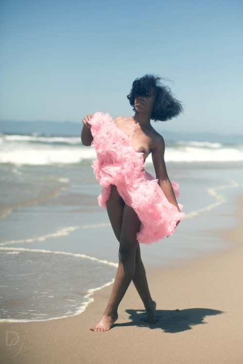 lola-lachelle:From my first nude shoot ever. The crashing of the waves and the harsh wind gusting pa