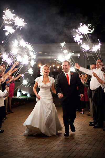 What an send-off! Provide guests with sparklers to make a dreamy reception exit. Check out more grea