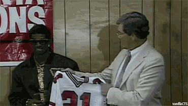 vanillacts:  Vintage Deion Sanders  damn, he was the original Trinidad James lmao,