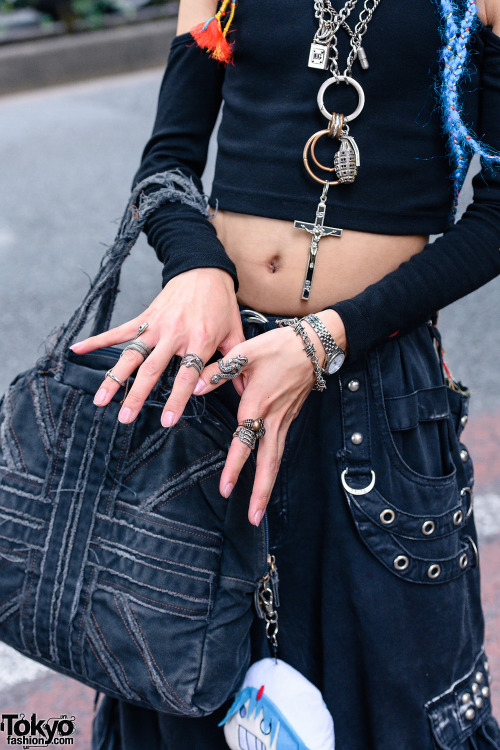 Japanese hair stylist Isana on the street in Harajuku. He&rsquo;s wearing a Never Mind the XU crop t