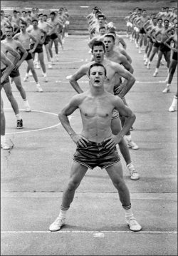 1bohemian:Male high school students exercise in a stringent physical education class, 1958 Carmicheal, California  