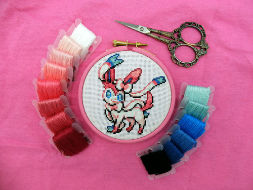 crossedoutstitchedup:  #700 Sylveon: Sylveon wraps its ribbonlike feelers around its Trainer’s arm b