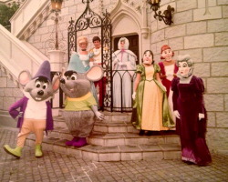 vintagedisneyparks:  retrodisney:  Vintage photo of Cinderella, Prince Charming, Fairy Godmother, Anastasia, Drizella, Lady Tremaine, Jaq and Gus. Look! The Tremaines aren’t face characters…. Cinderella and Charming are the only two face characters! 