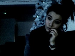 ttthea:  Sulking because I’m spending Christmas alone. Not even turning the tree lights on..  aww poor baby 