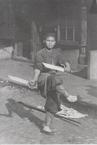 Man with butterfly knives, Chinatown in San Francisco circa 1900This man was a vendor of a medicated