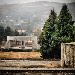 socialistmodernism:Memorial public garden in the village center,Cojusna, Straseni District,  built in 60-s, Architect L.Mogilevskii, Sculptor N. Epelbaum