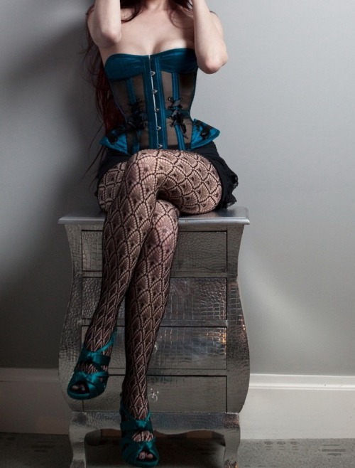 Oh. Oh. The shoes match the corset. I love that!