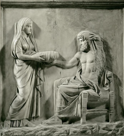 famousartthroughhistory: Roman relief of Rheia handing stone to Kronos, marble, 2nd c. CE
