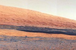 destructs:  Photo of Mars taken by NASA’s Curiosity rover.  NASA has been releasing pictures since early August, when Curiosity landed on Mars.The first color photo, which was released on Aug. 7, had a hazy, poor quality, because the dust cover was