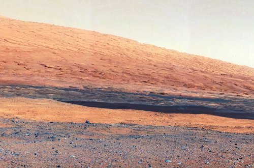 destructs:  Photo of Mars taken by NASA’s Curiosity rover.  NASA has been releasing pictures since early August, when Curiosity landed on Mars.The first color photo, which was released on Aug. 7, had a hazy, poor quality, because the dust cover was