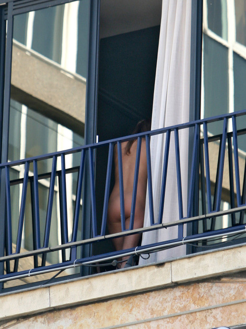 Naked on balcony adult photos