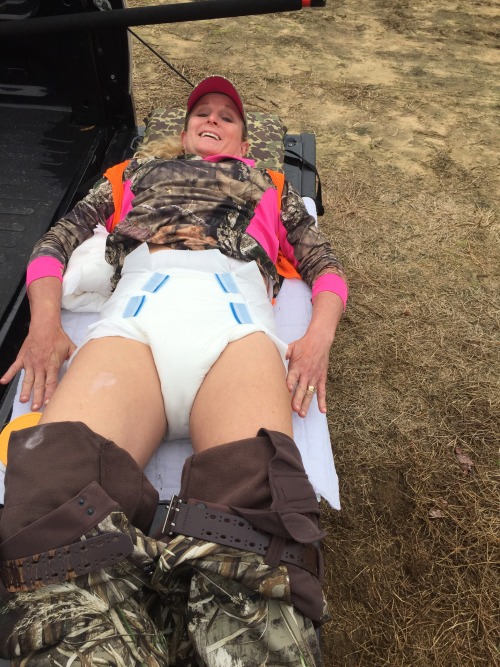 thebambinogirl:  I went hunting again yesterday and seen some nice deer but nothing I want s to shoot. We had to much equipment inside the truck so Daddy used the tailgate of the truck as a diaper changing table. I felt like a real baby having my diaper