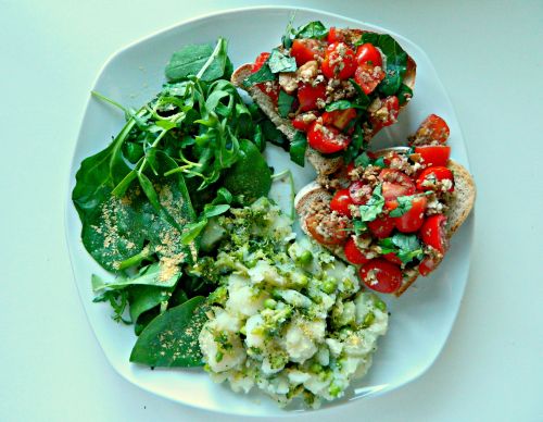 Baby plum tomatoes in balsamic and extra virgin olive oil with fresh basil on toasted sourdough, ‘ma