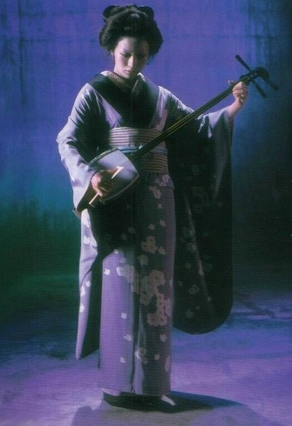 Shiina Ringo playing shamisen.  Image via Pinterest  