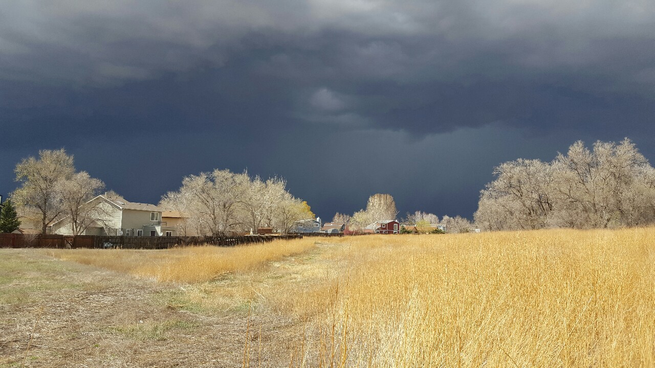 dolefuldream: Ominous clouds in the distance on a sunny day. April 12th, 2016. 