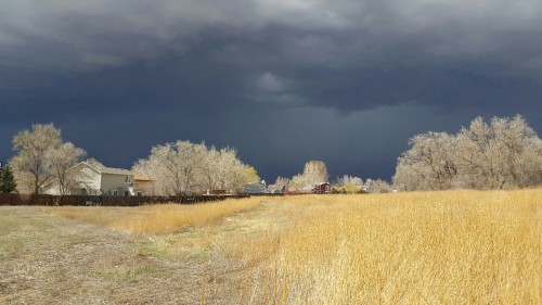 dolefuldream:Ominous clouds in the distance on a sunny day. April 12th, 2016.